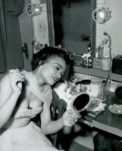 ladybegood:  Eartha Kitt with her cat Jinx in her dressing room,