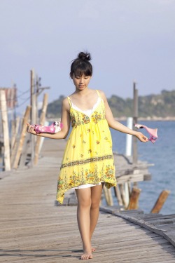 japanesesexygirl:  Rina Koike In Yellow Robe Near By The Sea