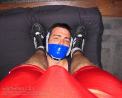 wrestle-me:  Gagged and held in place…looking up as he should