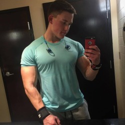 musclboy:  “And mom thought this shirt would last the year…”