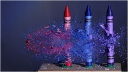 Wasting the waxworks (high speed photo of bullet fired through crayons)