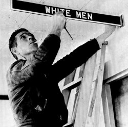 joeinct:    Restroom Discrimination 1960s Style - A workman removes