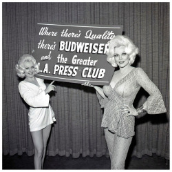 Liz Renay (at Right) and friend pose for photos promoting the
