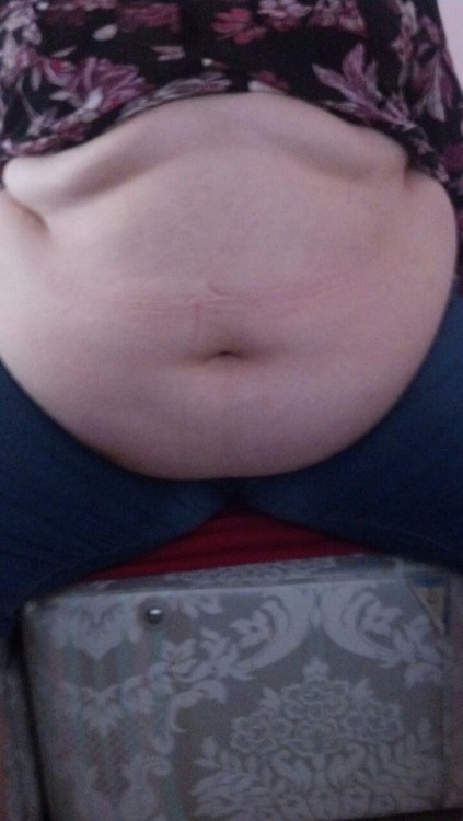 thefatbellycollection:  Just come back from a buffet with my boy… safe to say my belly is swollen!   It all goes towards making me bigger and fatter anyway :)  No pain, no gain.  What do you guys think?