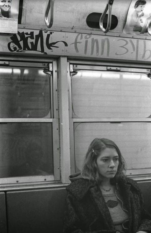 A young Kim Gordon of Sonic Youth riding the subway. Photo by