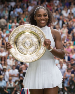 celebritiesofcolor:  Serena Williams of USA with the trophy after