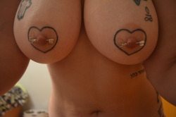 browneyedgummibear:  new nipple rings! keys to match my heart