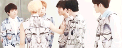 d-ongwoo:  dongwoo feeling myung’s chest jacket  〜(￣▽￣〜)