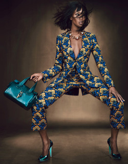 wmagazine:  Naomi Campbell is all legs in prints and pumps. 