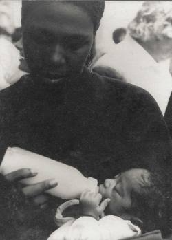 criticalmera: Afeni Shakur feeding baby Tupac