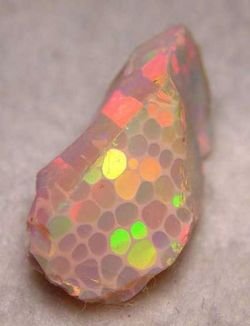 thehorsethief:  gorgeousgeology:  Honeycomb Opal is made when