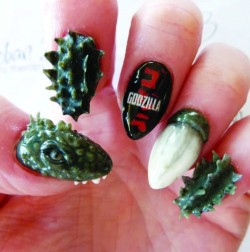 actias:  rumpshaker:  Godzilla nail art by Simone Gilbert in