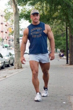 muscletits:  Torn shirt, tight skimpy shorts.  He is BEGGING