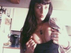 hiddenpink:  Goofing in the kitchen with my new tripod…. Being