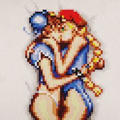 Street Fighter characters Chun Li and Cammy taking it to the mattresses.