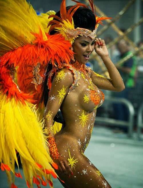 Naked woman in body paint at a Brazilian carnival.