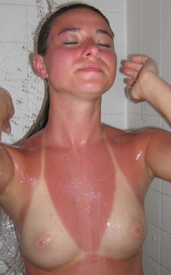 douchesworld:  #sunburn #tanlines #showershoot #breasts #nipples