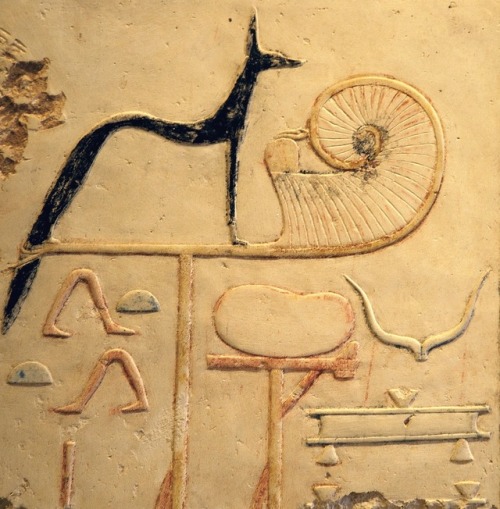 bigbadjackal: amntenofre:    the God Upuaut represented in His form of sacred jackal upon the Royal Standard and with the uraeus.Detail from the “Temple of Millions of Years” of King MerenPtah (ca. 1213–1203 BCE), west ‘Uaset’-Thebes    This