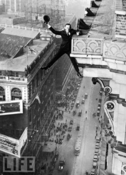 Harry Gardiner hangs from the 24th story of the Hotel McAlpin