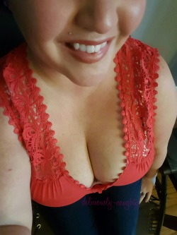 deliciously-naughty: Just some cleavage and a smile 😏