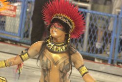 Topless at a Brazilian carnival, by Carlos Reis.