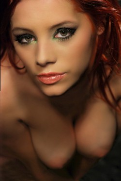 Beautiful closeup of gorgeous redhead Ariel with her breasts