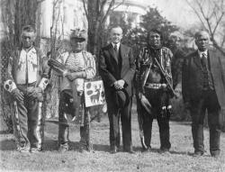 historicaltimes:  President Calvin Coolidge with four Osage Indians