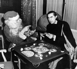  viα vintagegal: Bela Lugosi playing poker with Santa, 1940