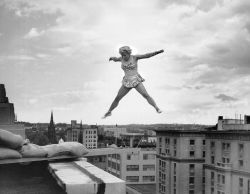  Betty Fox performs her acrobatic routine on a tiny platform