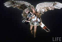 Carlo Bavagnoli - Jane Fonda being carried through the air by