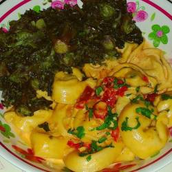 Veal tortellini in sundried tomato sauce with kalettes. #food
