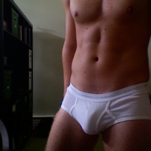 sexysexyboys:  briefsboy25:  Cute ass in his tighty whities!