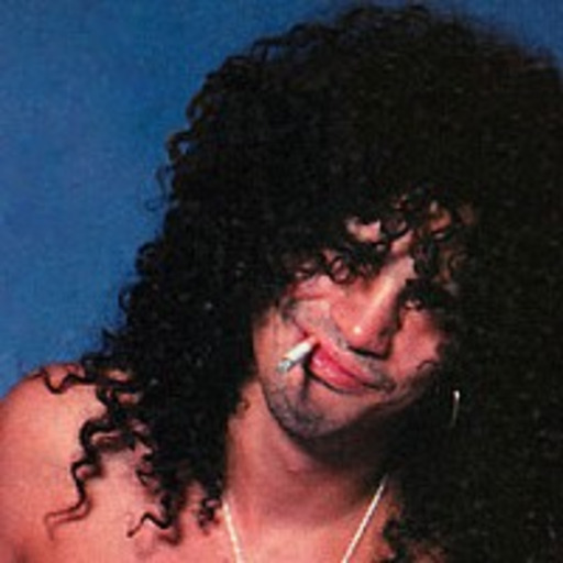 when Slash flips his perfect, curly hair