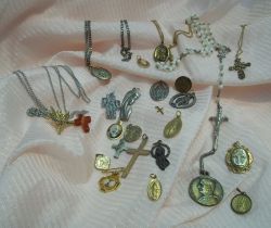 seiyoshis:  lot of medals and rosary beads 