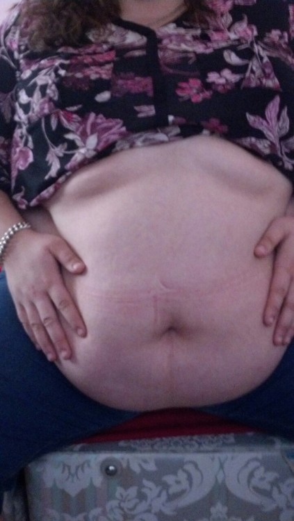 thefatbellycollection:  Just come back from a buffet with my boy… safe to say my belly is swollen!   It all goes towards making me bigger and fatter anyway :)  No pain, no gain.  What do you guys think?