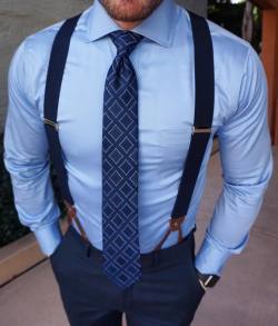 This is pure hotness for me. Suit and tie, suspenders.. And look