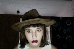 me being sad while wearing an assortment of hats