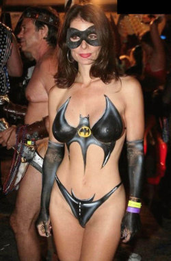 mommylovescock:Mrs Adams (53) and I (19) went to Fantasy Fest together. She spent most of the time there in only body paint like in this photo but actually as you can see she was completely naked. She&rsquo;s got such a hot body for her age she got a