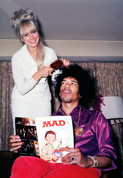 vintagegal:  Jimi Hendrix having his hair done while reading