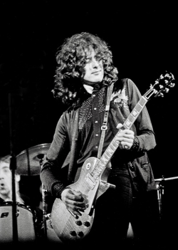 jefferson-mad-hippie:    Jimmy Page on stage during a concert