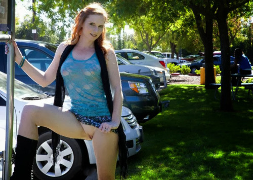 bestofexhibition:  #amateur redhead show her pantyless #pussy in a public parking with people there! #exhibition