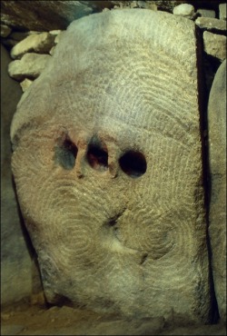 Three carved votive chambers in Gavrinis Dolmen passage grave,