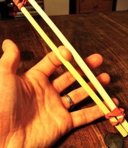 dare-master:  Chopstick Nipple Clamps Materials Required 2 pairs of chop sticks. Avoid wooden ones you snap apart to avoid splinters. 4 Elastic/rubber bands. Take one pair of chopsticks and hold them together. Wrap one elastic band around two of the ends,