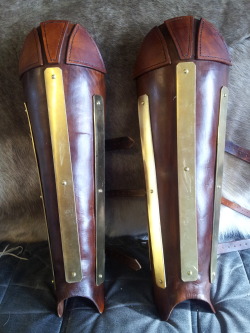 Greaves and bracers, made from 4mm leather and 2mm brass plate.