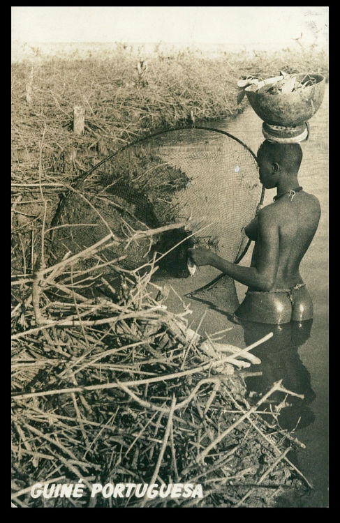 Bissau Guinean woman fishing, via eBay.