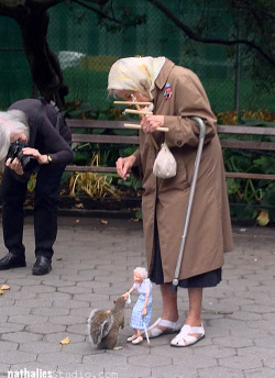 good:  85-year-old woman’s identical twin puppet feeds a squirrel