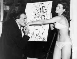 thiswastheirfinesthour:  Salvador Dalí kisses 25-year-old Raquel