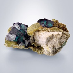 hematitehearts:  Fluorite (Purple & Green) on Mica &