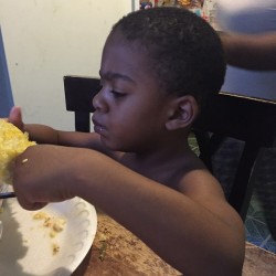 Half naked eating corn. Thuglife