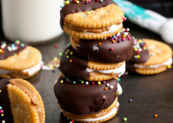 lustingfood:  Chocolate Dipped Fluffernutter Ritz Cookies 